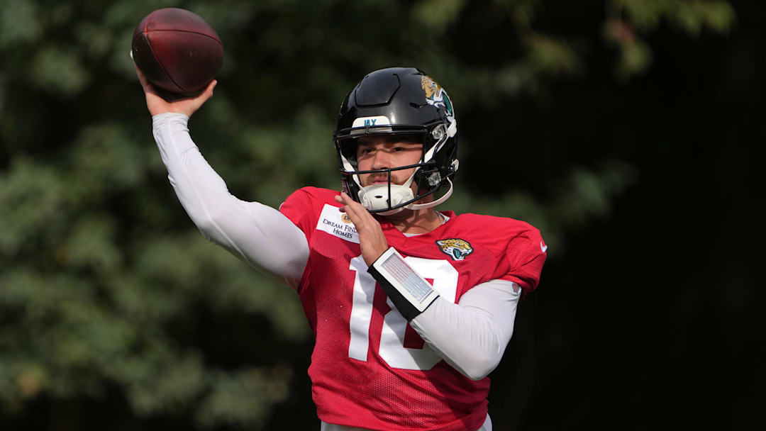 Oct 17, 2024; Watford, United Kingdom; Jacksonville Jaguars quarterback John Rhys Plumlee (18) throws the ball during practice at The Grove. Mandatory Credit: Kirby Lee-Imagn Images Oct 17, 2024; Watford, United Kingdom; Jacksonville Jaguars quarterback John Rhys Plumlee (18) throws the ball during practice at The Grove. Mandatory Credit: Kirby Lee-Imagn Images