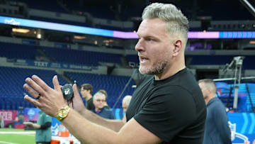 Pat McAfee watches workouts at the 2025 NFL Scouting Combine at Lucas Oil Stadium. 