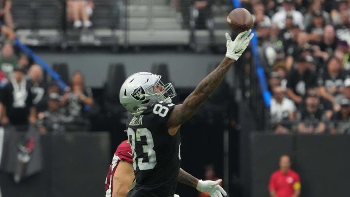 Sep 18, 2022; Paradise, Nevada, USA; Las Vegas Raiders tight end Darren Waller (83) attempts to catch the ball against the Arizona Cardinals in the first half at Allegiant Stadium. Mandatory Credit: Kirby Lee-USA TODAY Sports