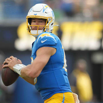 Sep 8, 2024; Inglewood, California, USA; Los Angeles Chargers quarterback Justin Herbert (10) throws the ball against the Las Vegas Raiders in the second half at SoFi Stadium. Mandatory Credit: Kirby Lee-Imagn Images