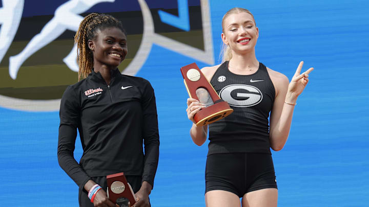Jun 8, 2024; Eugene, OR, USA; Rose Yeboah of Illinois and Elena Kulichenko of Georgia pose after tying for first in the women's high jump at 6-5 1/2 (1.97m) during the NCAA Track and Field Championships at Hayward Field. Mandatory Credit: Kirby Lee-Imagn Images Jun 8, 2024; Eugene, OR, USA; Rose Yeboah of Illinois and Elena Kulichenko of Georgia pose after tying for first in the women's high jump at 6-5 1/2 (1.97m) during the NCAA Track and Field Championships at Hayward Field. Mandatory Credit: Kirby Lee-Imagn Images