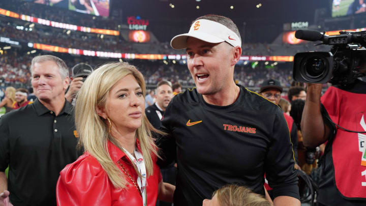 Sep 1, 2024; Paradise, Nevada, USA; Southern California Trojans head coach Lincoln Riley with wife Caitlin Riley after the game against the LSU Tigers at Allegiant Stadium. Mandatory Credit: Kirby Lee-USA TODAY Sports