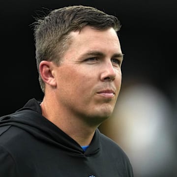 Aug 12, 2023; Inglewood, California, USA;  Los Angeles Chargers offensive coordinator Kellen Moore watches during the game against the Los Angeles Rams at SoFi Stadium. Mandatory Credit: Kirby Lee-Imagn Images