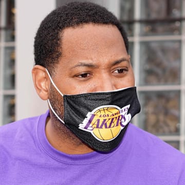 Nov 18, 2021; Los Angeles, CA, USA; Robert Horry wears a face mask during the Los Angeles Lakers Season of Giving Turkey Giveaway at The Salvation Army   Red Shield Youth & Community Center. Mandatory Credit: Kirby Lee-Imagn Images