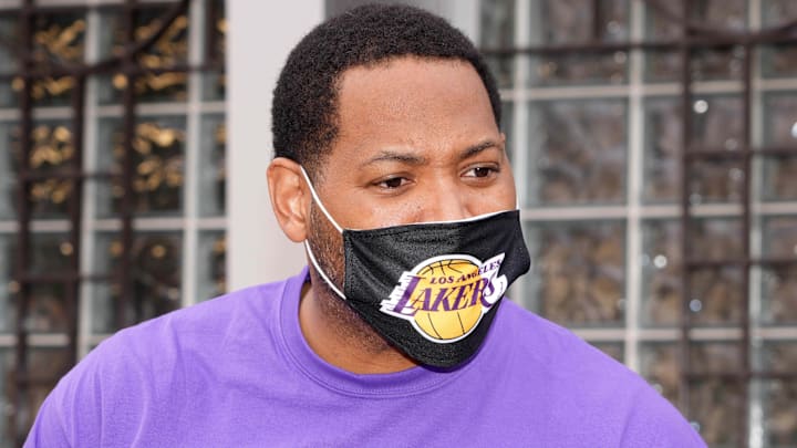 Nov 18, 2021; Los Angeles, CA, USA; Robert Horry wears a face mask during the Los Angeles Lakers Season of Giving Turkey Giveaway at The Salvation Army   Red Shield Youth & Community Center. Mandatory Credit: Kirby Lee-Imagn Images