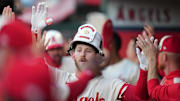 May 8, 2025; Anaheim, California, USA; Los Angeles Angels left fielder Taylor Ward (3) wears a fireman helmet after hitting a two-run home run in the first inning against the Toronto Blue Jays at Angel Stadium. Mandatory Credit: Kirby Lee-Imagn Images