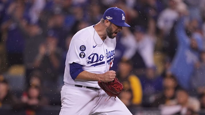 Oct 11, 2022; Los Angeles, California, USA; Los Angeles Dodgers relief pitcher Chris Martin (58) celebrates at the end of the game against the San Diego Padres during game one of the NLDS for the 2022 MLB Playoffs at Dodger Stadium. The Dodgers defeated the Padres 5-3. Mandatory Credit: Kirby Lee-Imagn Images