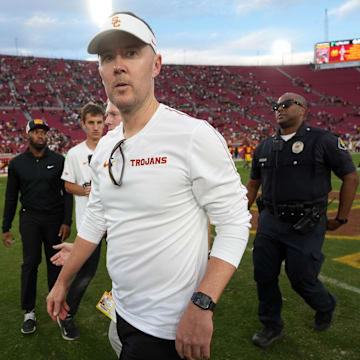 Southern California Trojans head coach Lincoln Riley leaves the field after the game against the Notre Dame Fighting Irish.