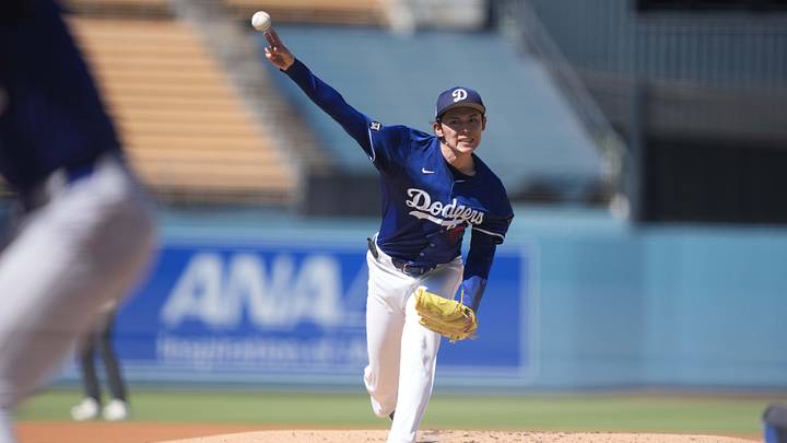 Aug 8, 2025; Los Angeles, California, USA; Los Angeles Dodgers pitcher Roki Sasaki (11) throws before the game against the Toronto Blue Jays at Dodger Stadium. Mandatory Credit: Kirby Lee-Imagn Images