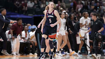 Apr 6, 2025; Tampa, FL, USA; UConn Huskies guard Paige Bueckers (5) celebrates in the second half during the national championship of the women's 2025 NCAA tournament against the South Carolina Gamecocks at Amalie Arena. Mandatory Credit: Kirby Lee-Imagn Images