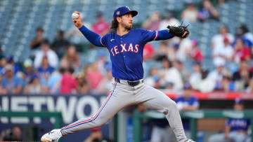 Jul 10, 2024; Anaheim, California, USA; Texas Rangers starting pitcher Michael Lorenzen (23) throws in the first inning against the Los Angeles Angels at Angel Stadium. 