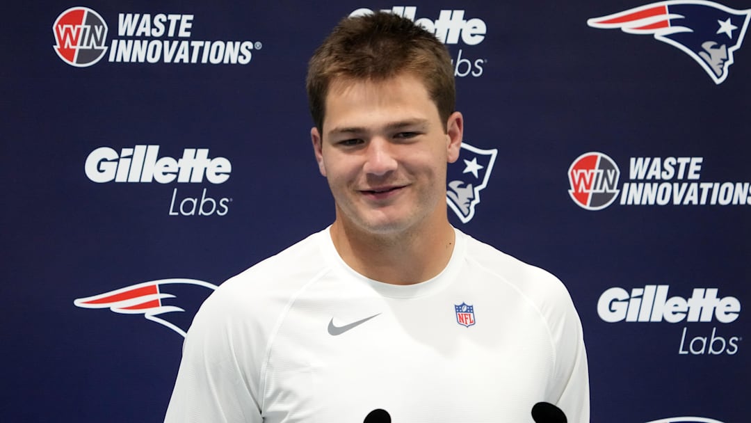 Oct 18, 2024; London, United Kingdom; New England Patriots quarterback Drake Maye (10) at press conference at the Harrow School. Mandatory Credit: Kirby Lee-Imagn Images