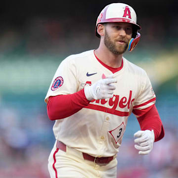 May 8, 2025; Anaheim, California, USA; Los Angeles Angels left fielder Taylor Ward (3) gestures after hitting a two-run home run in the first inning against the Toronto Blue Jays at Angel Stadium.