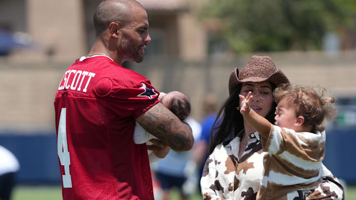 Dallas Cowboys quarterback Dak Prescott visits with fiancee Sarah Jane Ramos and daughters MJ Rose and Aurora during training camp 