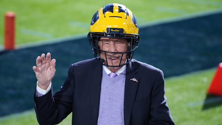 Lee Corso wears a Michigan helmet as he picks the Wolverines on the set of ESPN College Gameday ahead of the Rose Bowl in January 2024. 