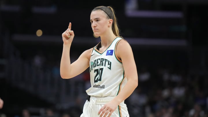 Aug 28, 2024; Los Angeles, California, USA; New York Liberty guard Sabrina Ionescu (20) gestures against the LA Sparks in the first half at Crypto.com Arena. Mandatory Credit: Kirby Lee-USA TODAY Sports