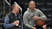 Feb 25, 2024; Los Angeles, California, USA; LA Clippers president of basketball operations Lawrence Frank (left) talks with coach Tyronn Lue before the game against the Sacramento Kings at Crypto.com Arena. Mandatory Credit: Kirby Lee-Imagn Images