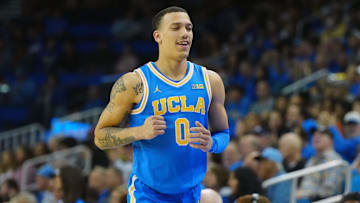 Mar 8, 2025; Los Angeles, California, USA; UCLA Bruins guard Kobe Johnson (0) reacts in the second half against the Southern California Trojans at Pauley Pavilion presented by Wescom. Mandatory Credit: Kirby Lee-Imagn Images