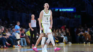 Aug 20, 2025; Los Angeles, California, USA; Dallas Wings guard Paige Bueckers (5) celebrates in the second half against the LA Sparks at Crypto.com Arena. Mandatory Credit: Kirby Lee-Imagn Images