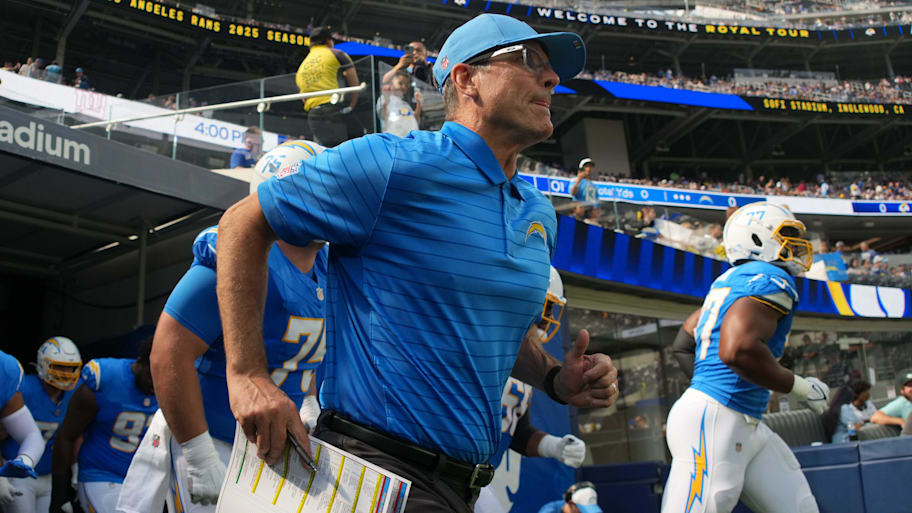 Los Angeles Chargers coach Jim Harbaugh enters the field before the game against the Los Angeles Rams at SoFi Stadium. | Kirby Lee-Imagn Images