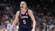 Apr 6, 2025; Tampa, FL, USA; UConn Huskies guard Paige Bueckers (5) celebrates in the second half during the national championship of the women's 2025 NCAA tournament against the South Carolina Gamecocks at Amalie Arena. Mandatory Credit: Kirby Lee-Imagn Images