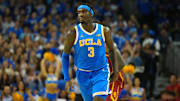 Mar 8, 2025; Los Angeles, California, USA; UCLA Bruins guard Eric Dailey Jr. (3) reacts after a three-point basket against the Southern California Trojans in the first half at Pauley Pavilion presented by Wescom. Mandatory Credit: Kirby Lee-Imagn Images