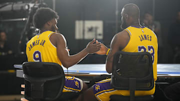 Sep 30, 2024; El Segundo, CA, USA; Los Angeles Lakers forward LeBron James (23) with son Bronny James (9) during media day at the UCLA Health Training Center. Mandatory Credit: Kirby Lee-Imagn Images