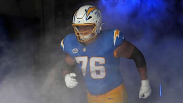 Sep 8, 2024; Inglewood, California, USA; Los Angeles Chargers offensive tackle Joe Alt (76) enters the field before the game against the Las Vegas Raiders at SoFi Stadium. Mandatory Credit: Kirby Lee-Imagn Images