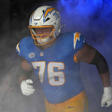 Sep 8, 2024; Inglewood, California, USA; Los Angeles Chargers offensive tackle Joe Alt (76) enters the field before the game against the Las Vegas Raiders at SoFi Stadium. Mandatory Credit: Kirby Lee-Imagn Images