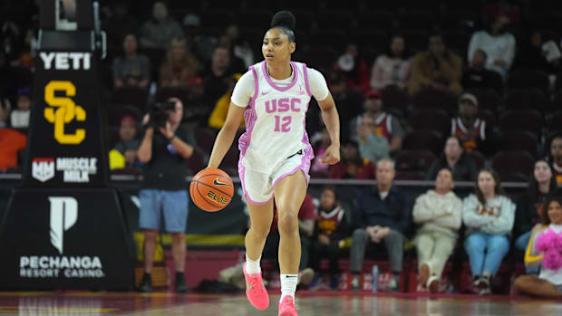Feb 19, 2025; Los Angeles, California, USA; Southern California Trojans guard JuJu Watkins (12) dribbles the ball against the