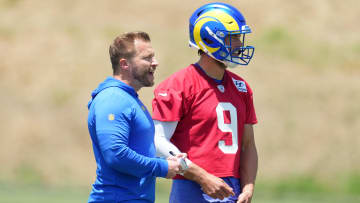 May 21, 2024, Thousand Oaks, California, USA; Los Angeles Rams coach Sean McVay (left) talks with quarterback Matthew Stafford (9) during organized team activities at Cal Lutheran University. Mandatory Credit: Kirby Lee-USA TODAY Sports