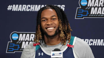 Mar 19, 2025; Wichita, KS, USA; North Carolina-Wilmington Seahawks forward Khamari McGriff (21) at press conference at Intrust Bank Arena. Mandatory Credit: Kirby Lee-Imagn Images