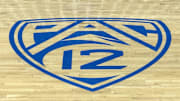 Dec 22, 2023; Los Angeles, California, USA; The Pac-12 Conference logo on the court at Pauley Pavilion presented by Wescom. Mandatory Credit: Kirby Lee-Imagn Images