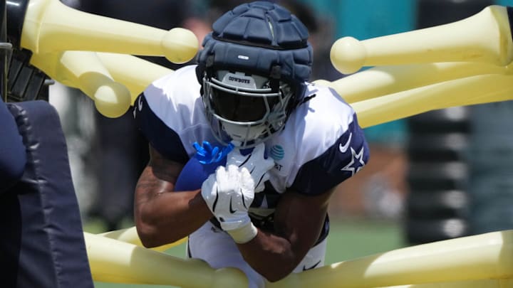 Dallas Cowboys running back Jaydon Blue carries the ball at training camp at the River Ridge Fields in Oxnard. Dallas Cowboys running back Jaydon Blue carries the ball at training camp at the River Ridge Fields in Oxnard.