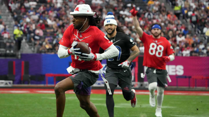 Feb 5, 2023; Paradise, Nevada, USA; AFC receiver Davante Adams of the Las Vegas Raiders (17) carries the ball against the NFC during the Pro Bowl Games at Allegiant Stadium. Mandatory Credit: Kirby Lee-USA TODAY Sports