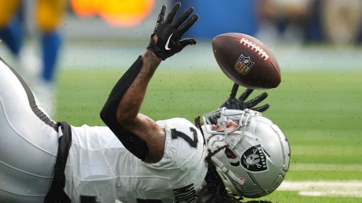 Sep 8, 2024; Inglewood, California, USA; Las Vegas Raiders safety Tre'von Moehrig (7) attempts to intercept a pass against the Los Angeles Chargers in the second half at SoFi Stadium. Mandatory Credit: Kirby Lee-Imagn Images