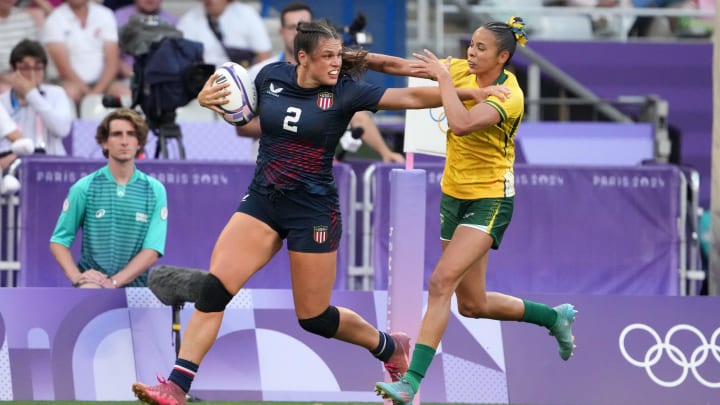 Jul 28, 2024: United States forward Ilona Maher carries the ball against Brazil back Gabriela Lima during the Paris 2024 Olympic Summer Games at Stade de France.