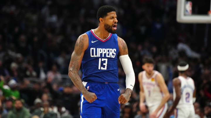 Jan 16, 2024; Los Angeles, California, USA; LA Clippers forward Paul George (13) celebrates against the Oklahoma City Thunder in the second half at Crypto.com Arena. Mandatory Credit: Kirby Lee-USA TODAY Sports