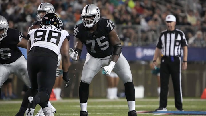 The Atlanta Falcons have signed former Las Vegas Raiders offensive tackle Brandon Parker.