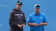 Los Angeles Chargers coach Jim Harbaugh and general manager Joe Hortiz.