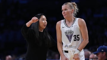 May 23, 2025; Los Angeles, California, USA; Golden State Valkyries coach Natalie Nakase (left) talks with guard Julie Vanloo (35) in the first half against the LA Sparks at Crypto.com Arena. Mandatory Credit: Kirby Lee-Imagn Images