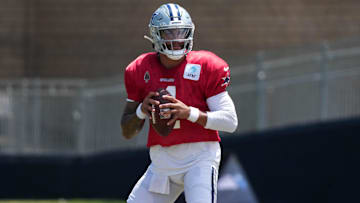 Dallas Cowboys quarterback Dak Prescott throws the ball at training camp at the River Ridge Fields.