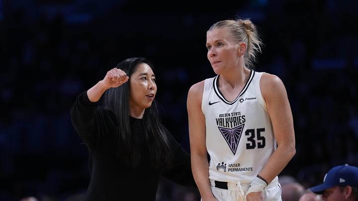May 23, 2025; Los Angeles, California, USA; Golden State Valkyries coach Natalie Nakase (left) talks with guard Julie Vanloo (35) in the first half against the LA Sparks at Crypto.com Arena. Mandatory Credit: Kirby Lee-Imagn Images