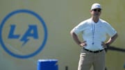 Los Angeles Chargers coach Jim Harbaugh looks on during offseason workouts at The Bolt. 