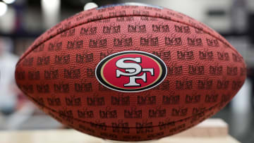 A football with a San Francisco 49ers logo 