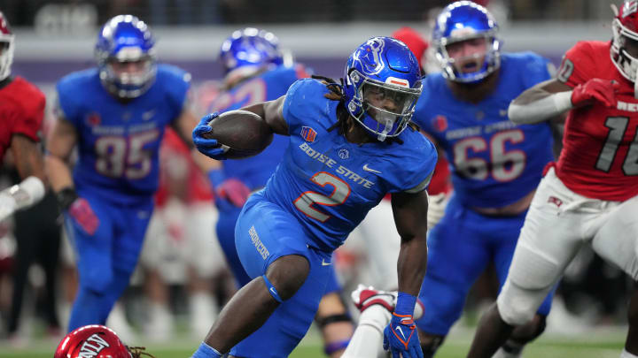 Dec 2, 2023; Las Vegas, NV, USA; Boise State Broncos running back Ashton Jeanty (2) carries the ball against the UNLV Rebels in the second half during the Mountain West Championship at Allegiant Stadium. Mandatory Credit: Kirby Lee-USA TODAY Sports