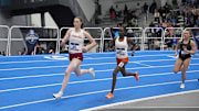 Roisin Willis of Stanford and Gladys Chepngetich of Clemson run in a women's 800m heat during the NCAA Indoor Championships at the Virginia Beach Sports Center. 