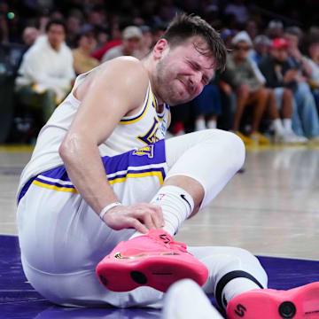 Mar 16, 2025; Los Angeles, California, USA; Los Angeles Lakers guard Luka Doncic (77) reacts against the Phoenix Suns in the second half at Crypto.com Arena. Mandatory Credit: Kirby Lee-Imagn Images