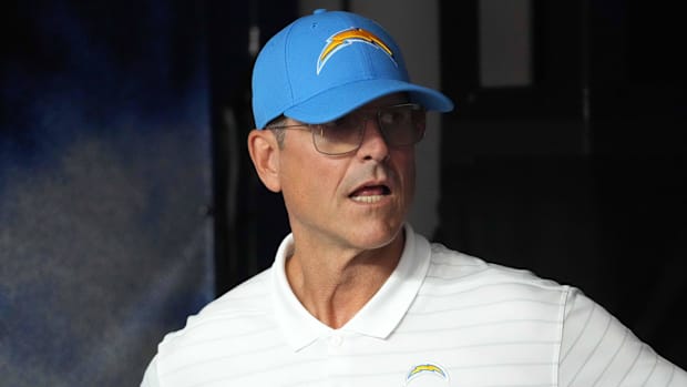 Los Angeles Chargers coach Jim Harbaugh prepares to enter the field 