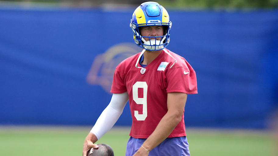 Matthew Stafford has been battling a back injury during training camp.  | Kirby Lee-Imagn Images